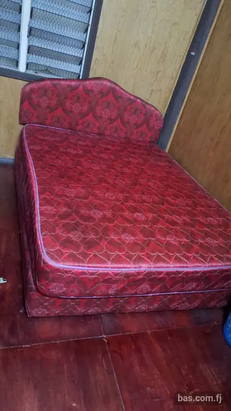 Selling Queen size bed with inner mattress